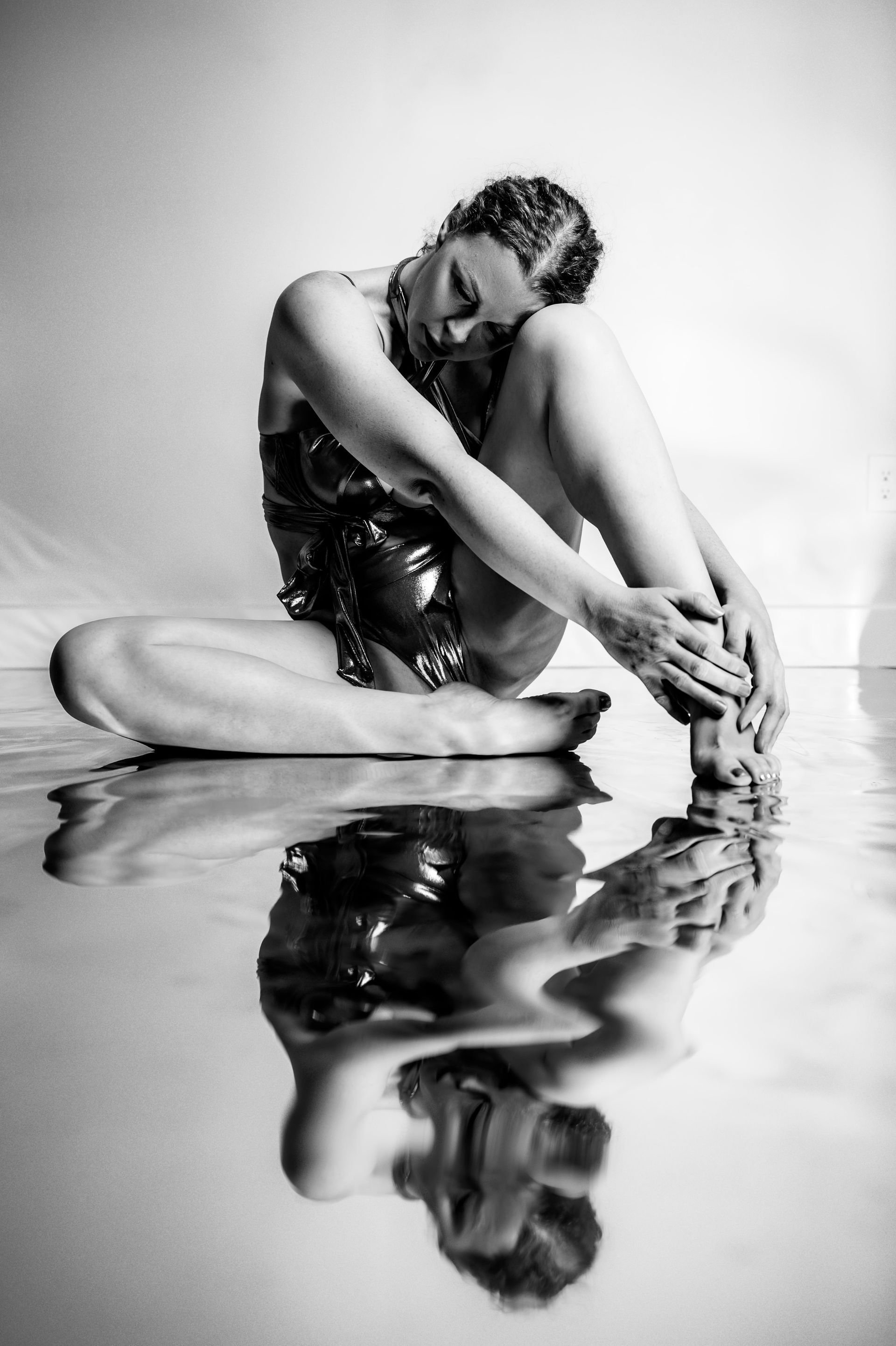 Sexy boudoir shot of a woman lying on a bed 