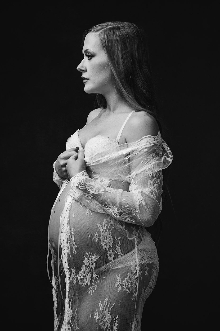 maternity profile image of woman in white lace robe