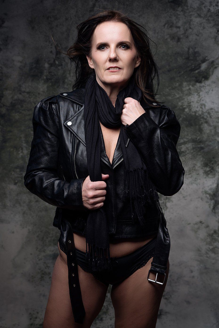 sexy portrait of woman in leather jacket