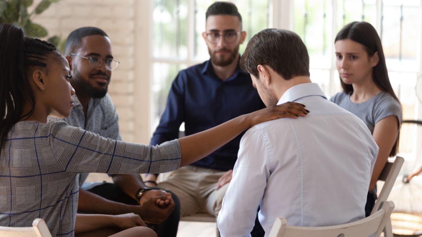 A Group of People Are Sitting in A Circle — Moving Beyond OK In Springwood, QLD