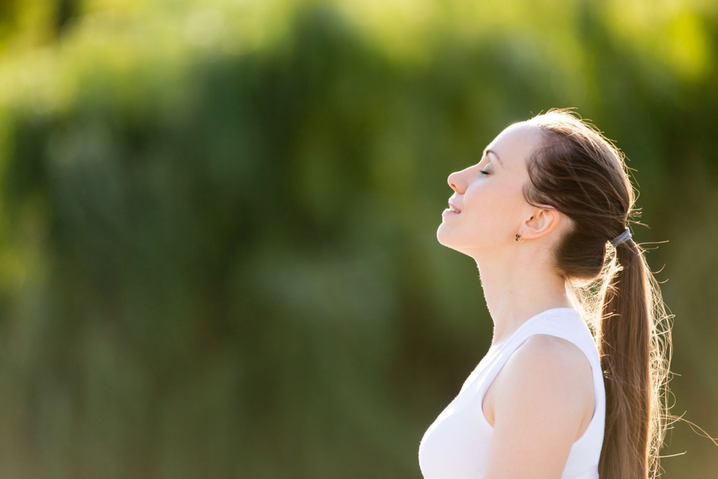 A Woman Is Standing in A Field — Moving Beyond OK In Meadowbrook, QLD