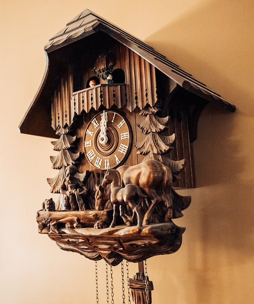 A Charming Wooden Clock Sold in Columbia, MO by Atterberry Auction & Realty Co.