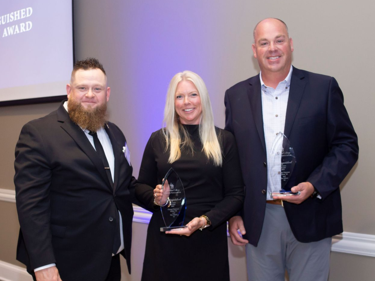 Crystal & Tim Elliott Accept The Distinguished Alumni Award From Columbia College.