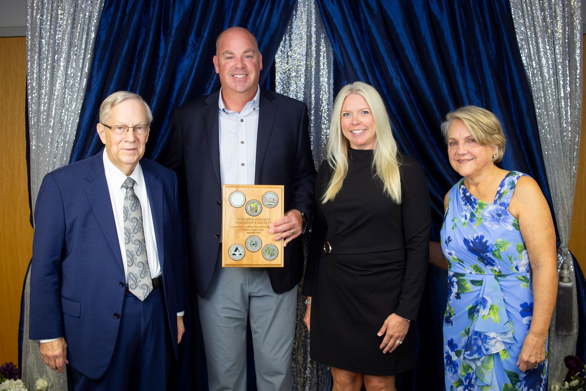 Crystal & Tim Elliott Accept The Distinguished Alumni Award From Columbia College in 2025.