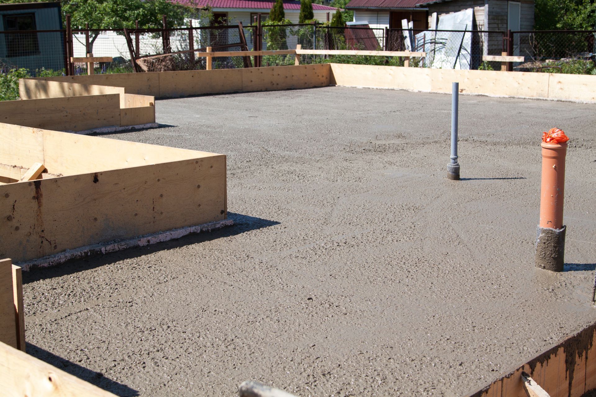 Gravel base compacted and formed for concrete slab pour, worked on by Elite Form Concrete in Rio Rancho, NM.
