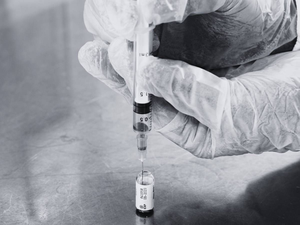 Syringing up vitamin b12 before providing a B12 vitamin injection