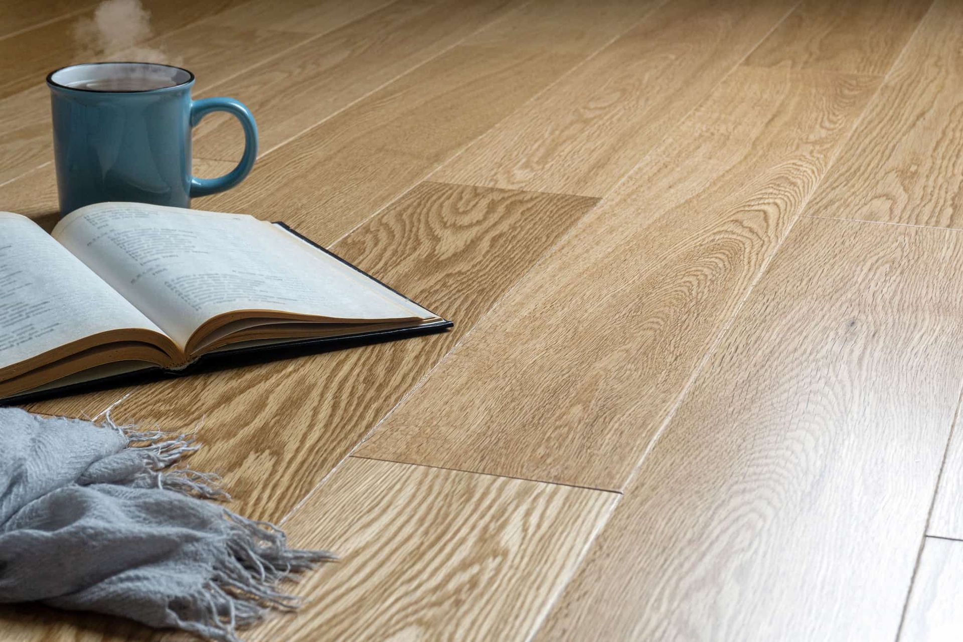 Book On Timber Floor — Flooring in Kempsey, NSW