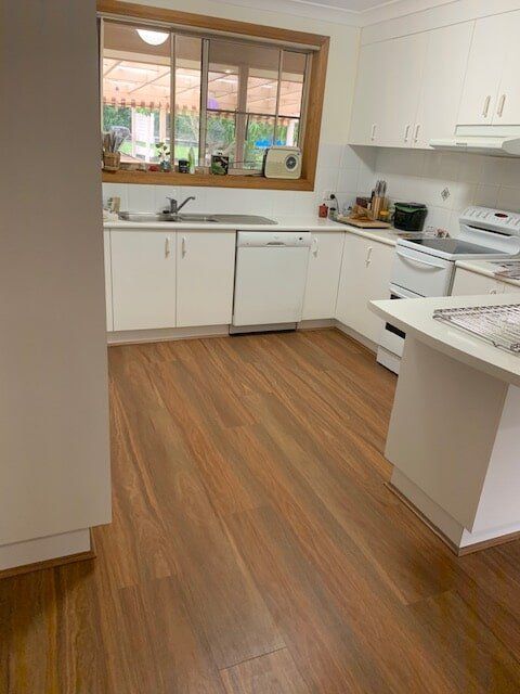 Kitchen with timber floor — Flooring in Kempsey, NSW