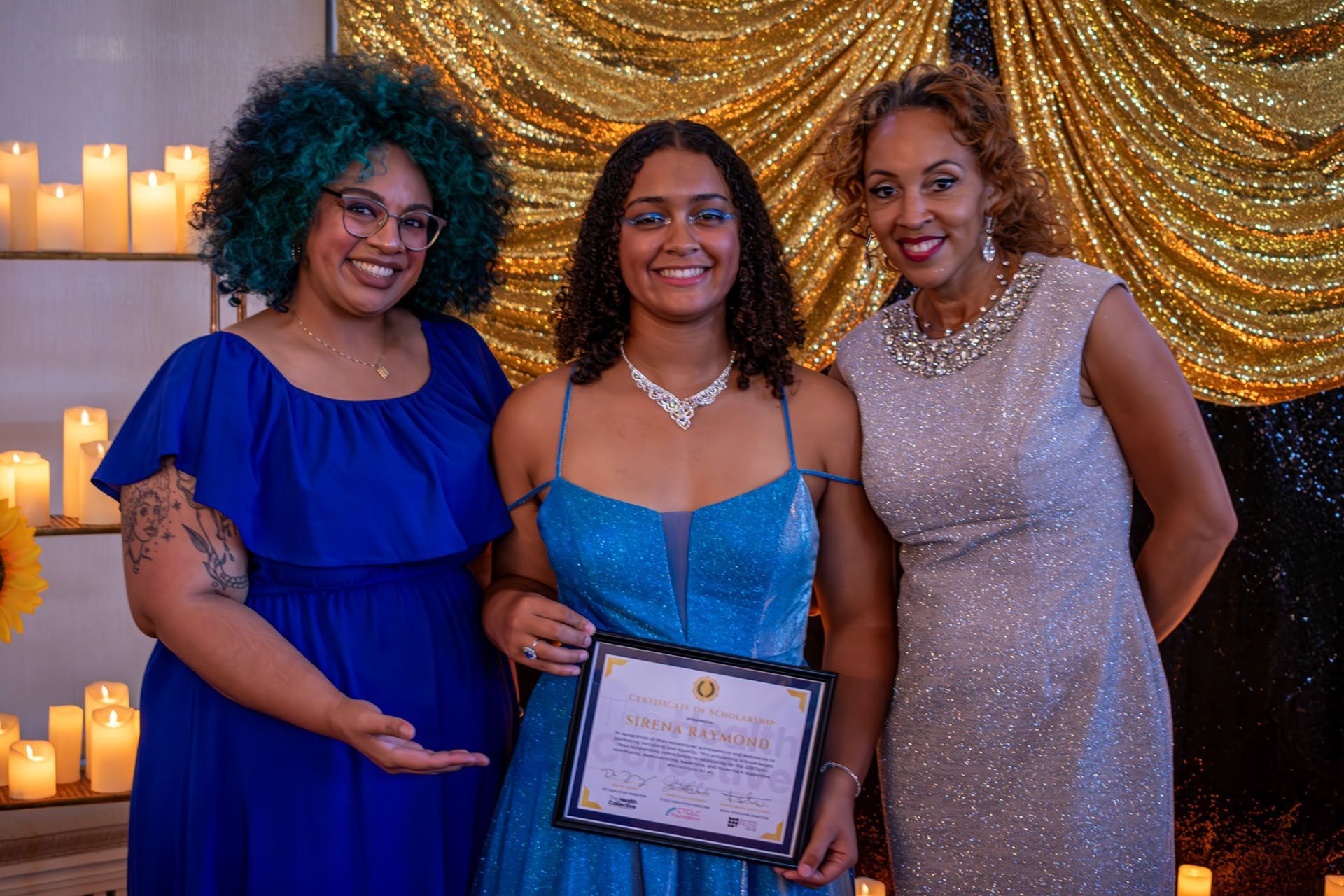 Two people with backpacks are walking up a set of colorful stairs.