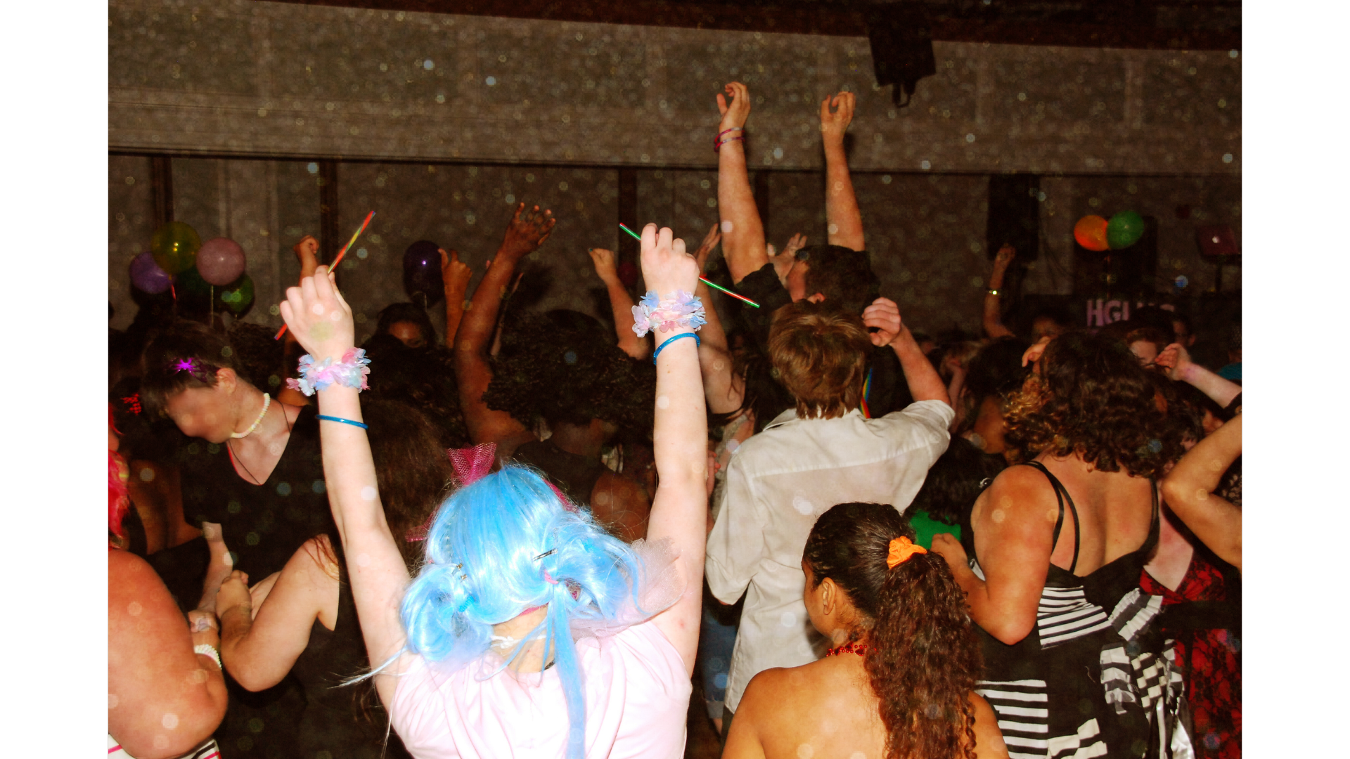 A group of LGBTQ+ youth are dancing at prom!