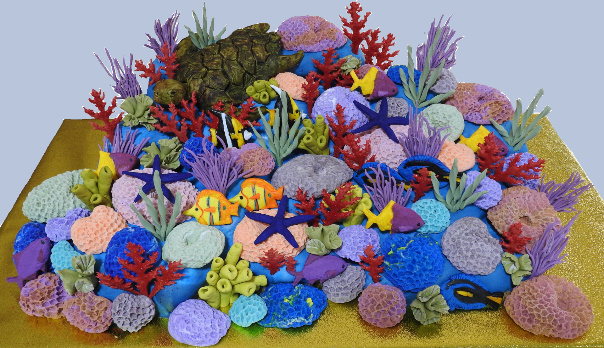 Reef shaped Birthday cake with coral, turtle and fish.