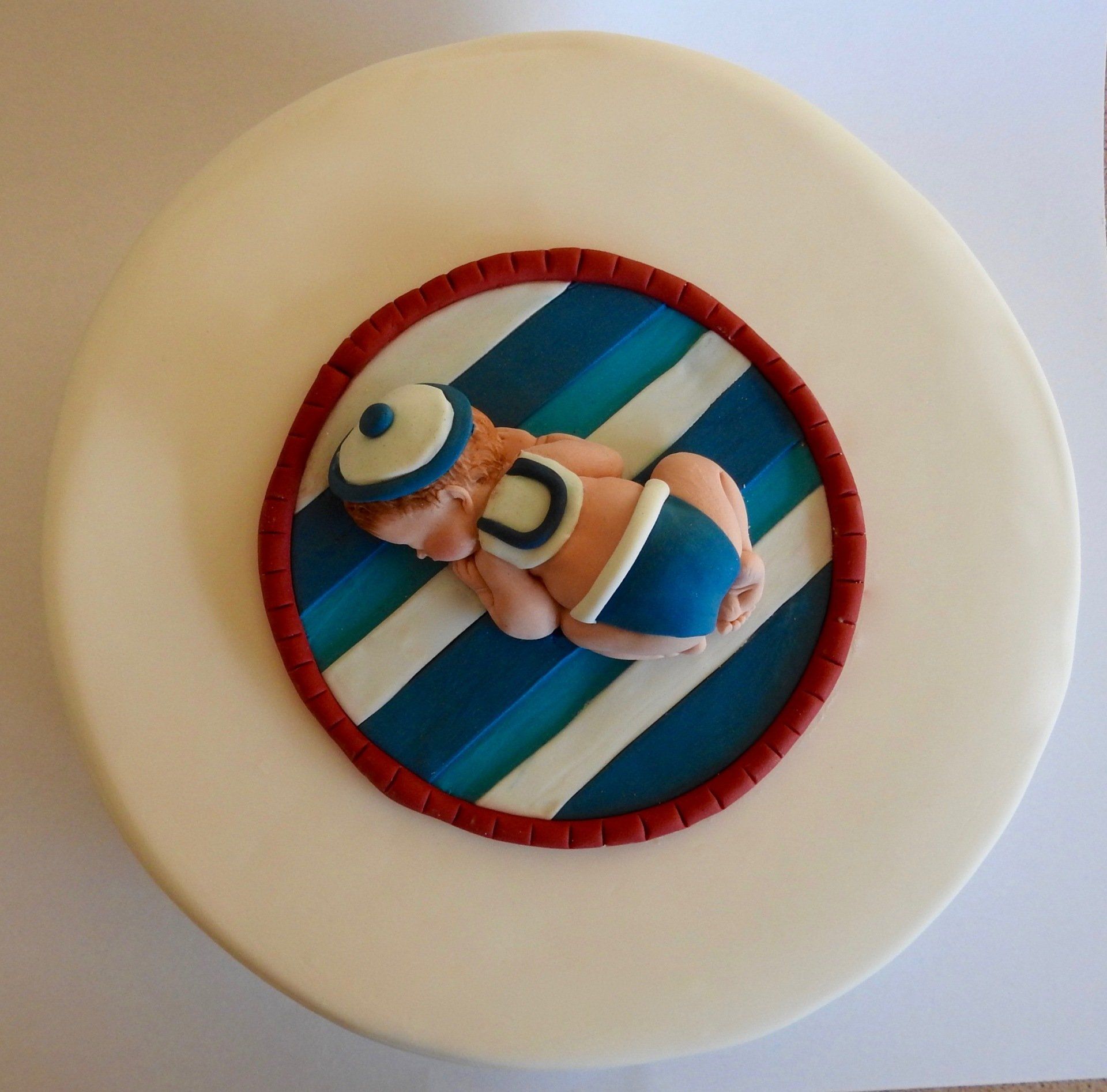 Gorgeous Baby Boy Cake Topper. Sleepy Baby Boy in sailors outfit.