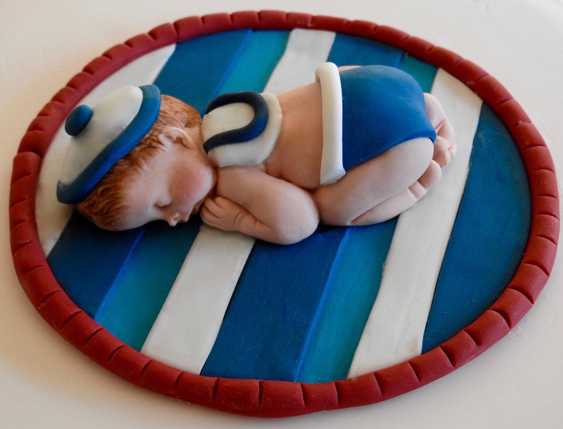 Gorgeous Baby Boy Cake Topper. Sleepy Baby Boy in sailors outfit.