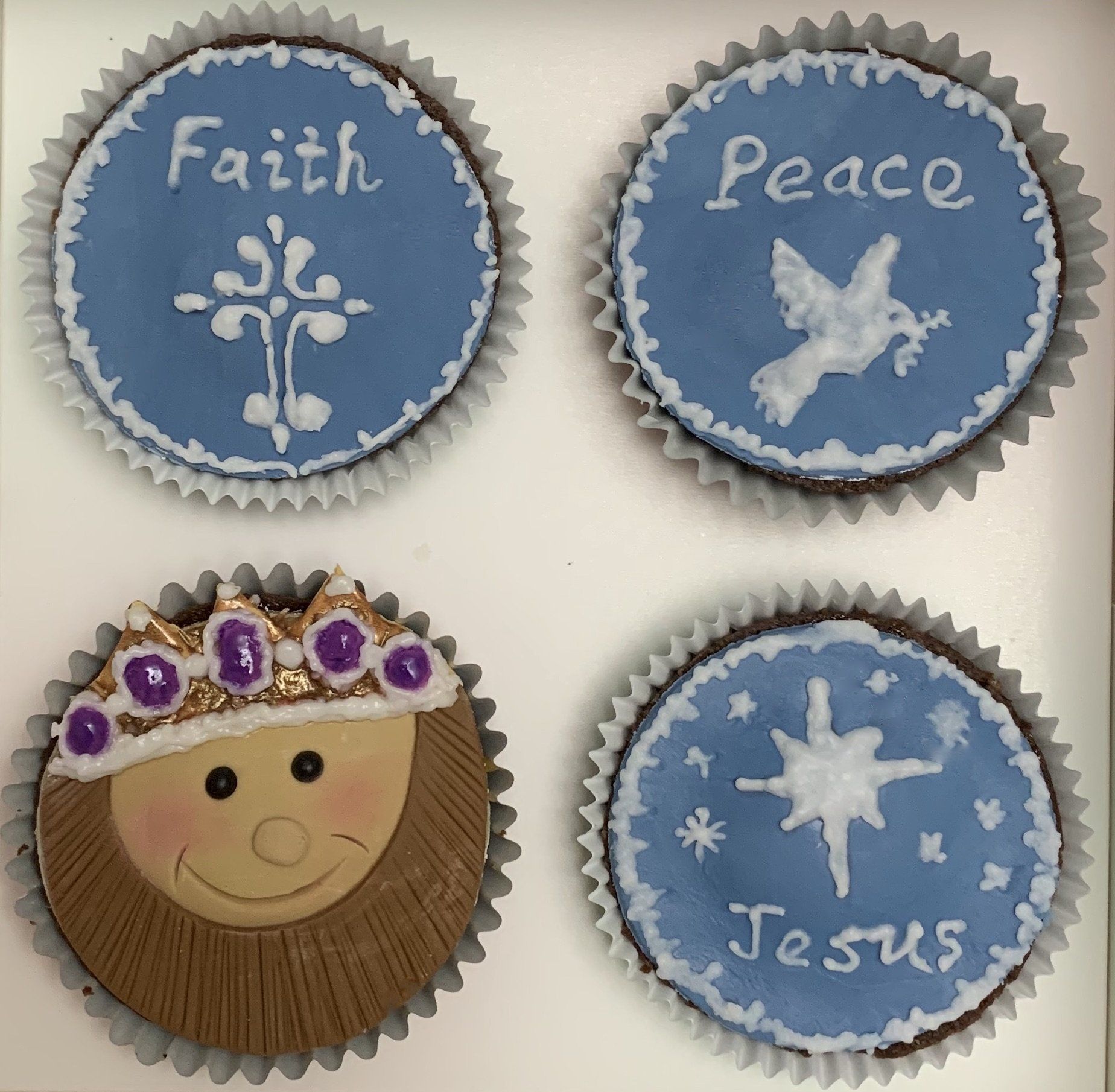 Nativity Cupcakes set 4 of 4 Wise Man, piped word Faith with piped cross, Piped word peace with piped dove and piped stars with piped word Jeus