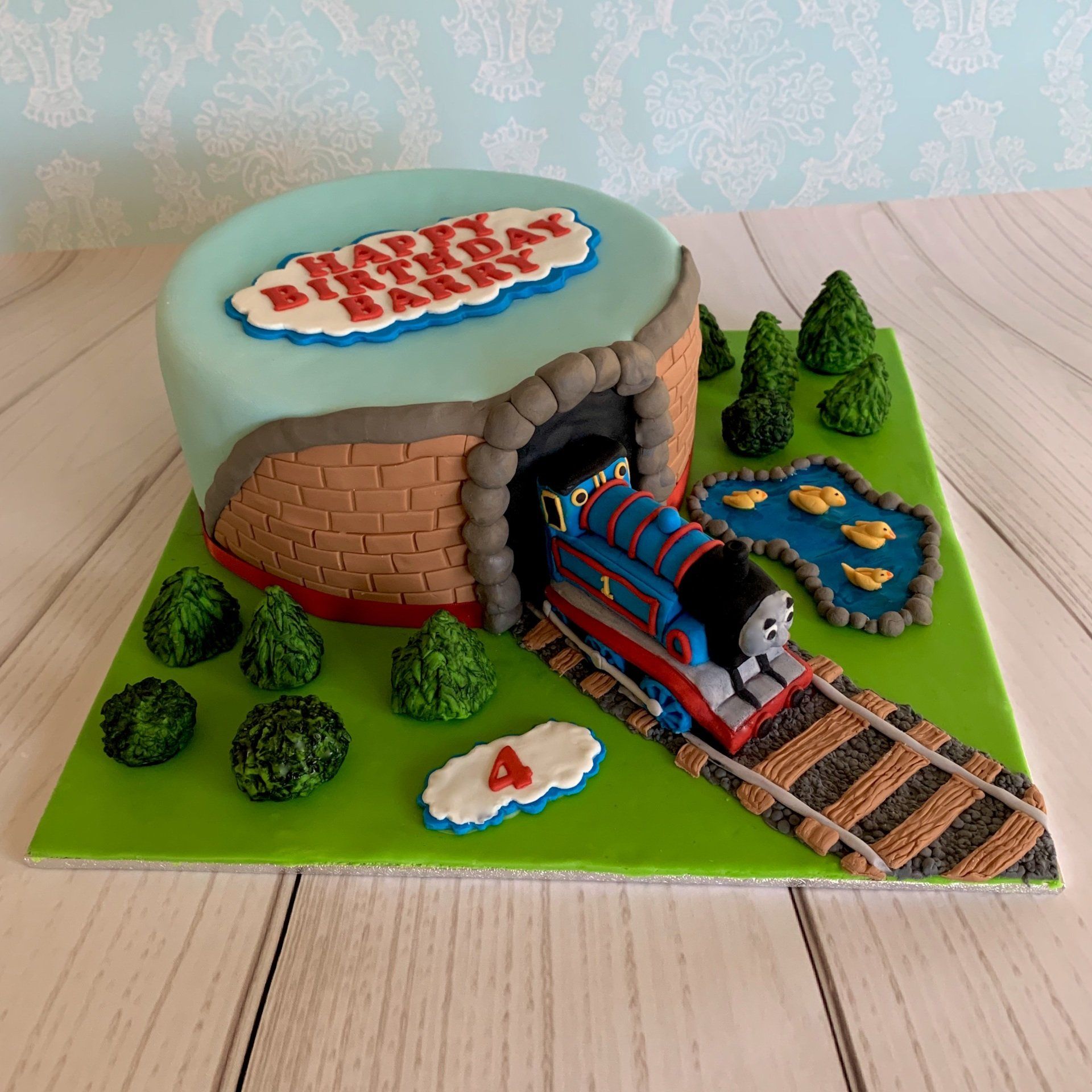 4th Boys Birthday Cake Train coming through tunnel with trees, grass and a duck pond