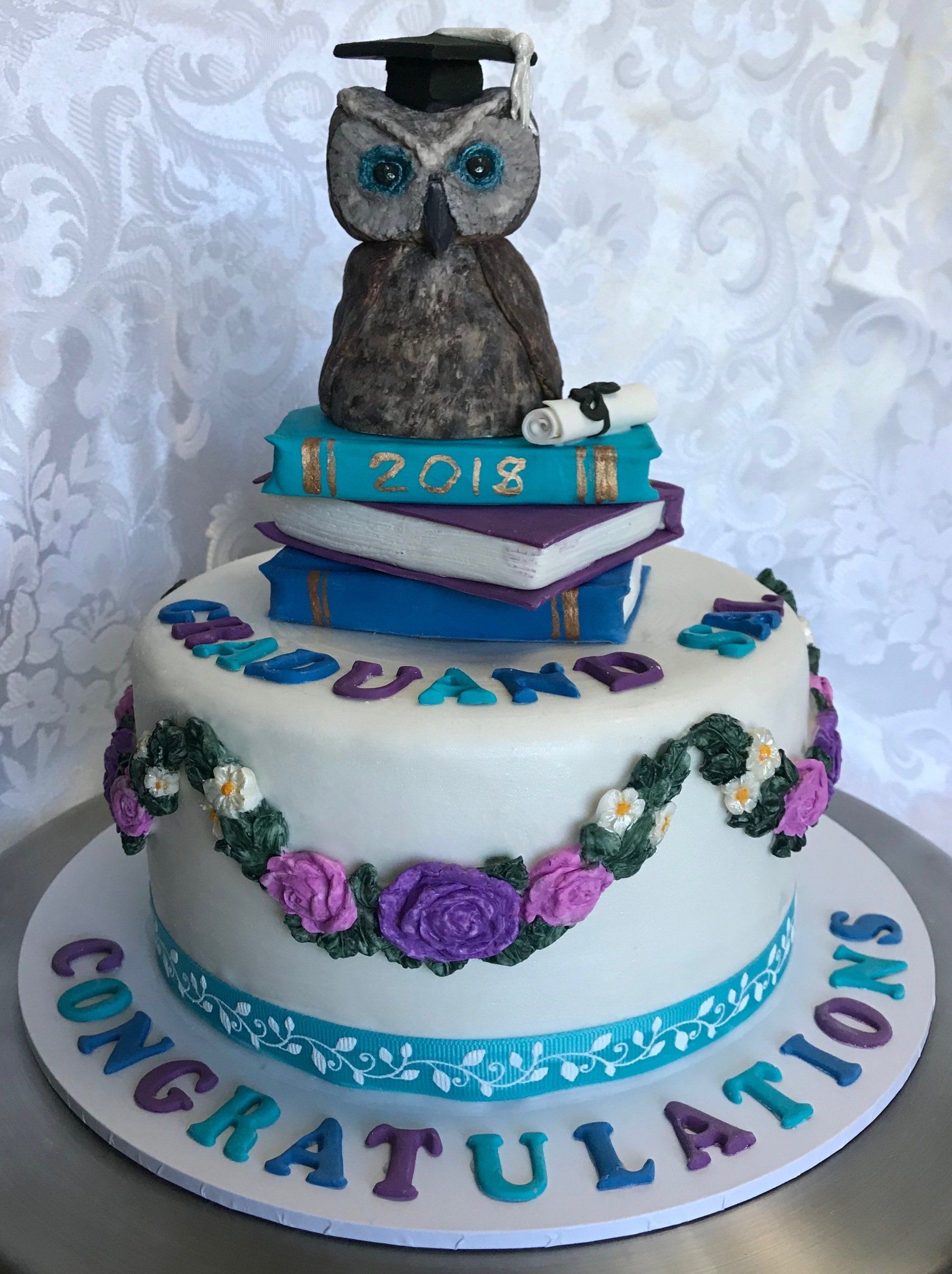 Graduation Cake with roses books and gorgeous graduation owl topper. With Happy Customer