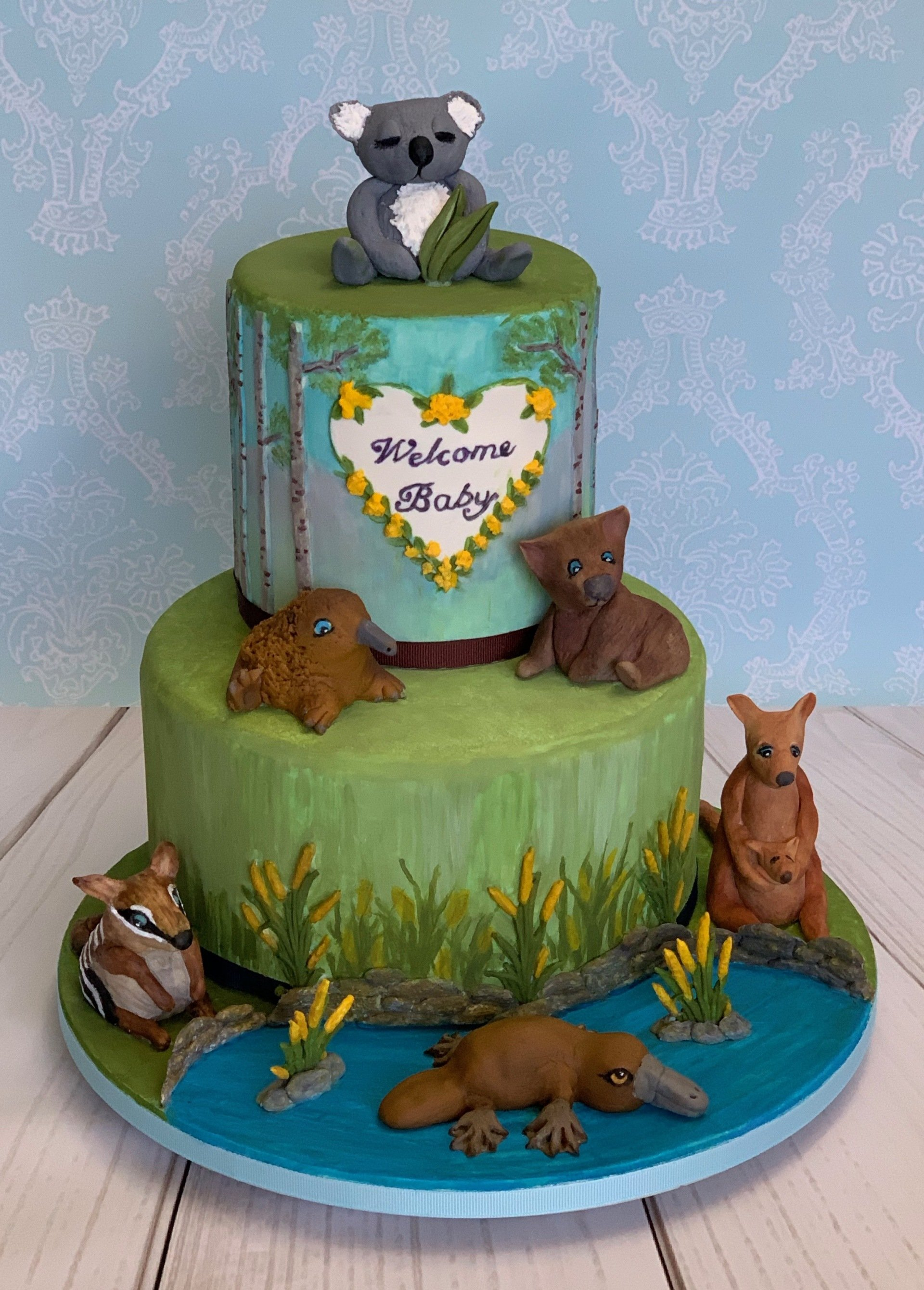 Baby Shower two tier cake with Fondant Australian animals.