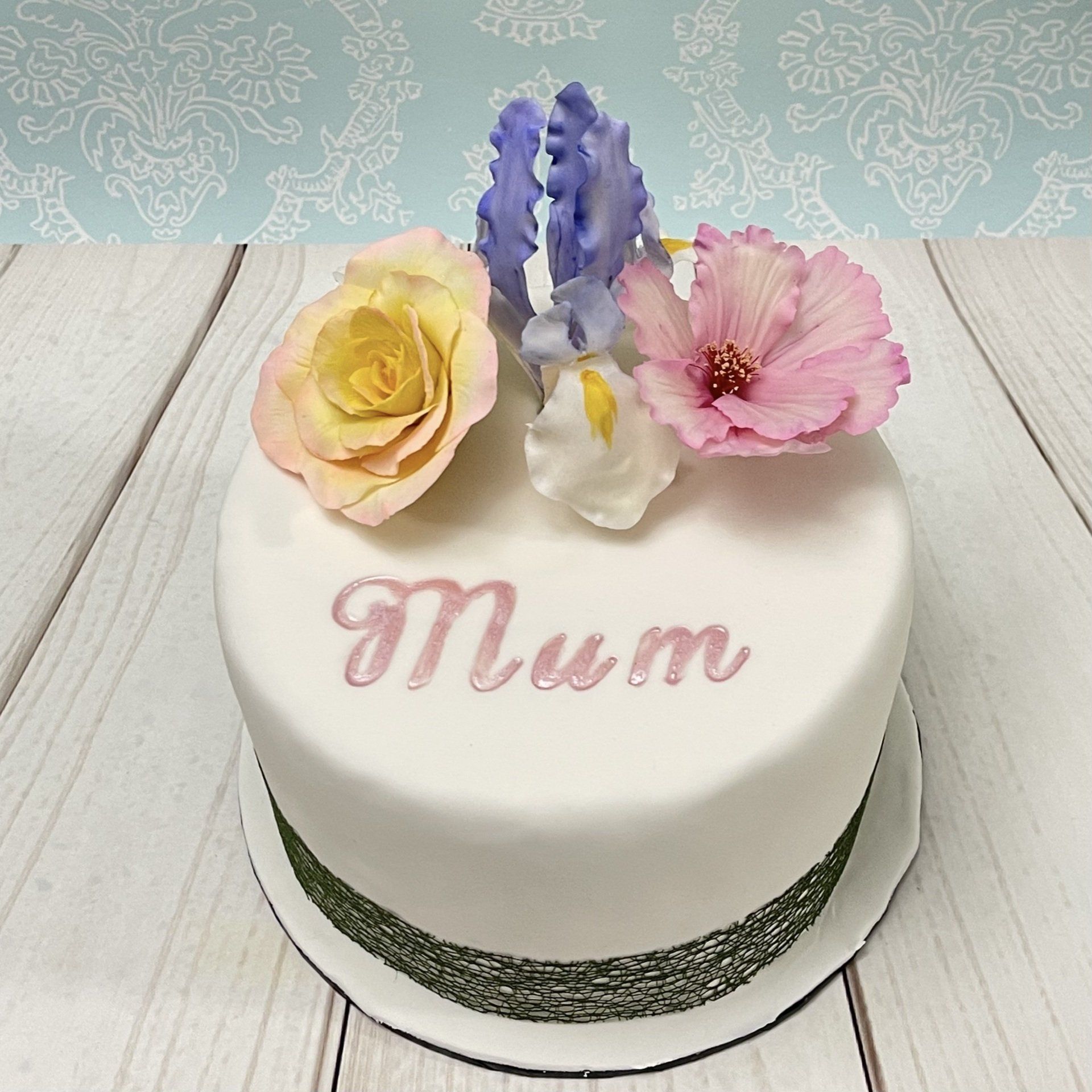 Small Birthday cake with sugar Rose, Sugar Iris and Sugar Cosmos flower and a hand painted Mum