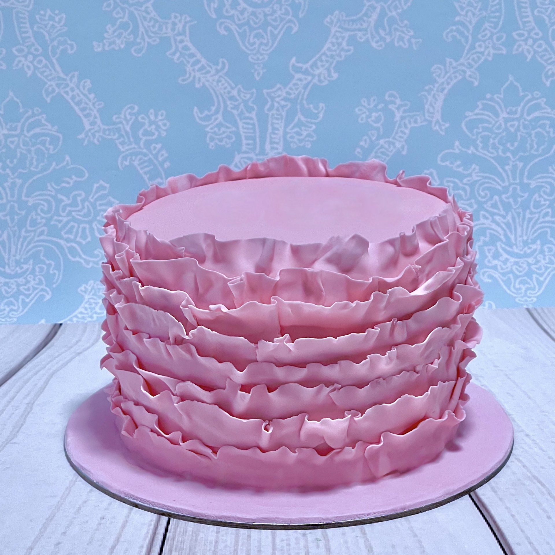 Pink Birthday Cake with Pink Fondant Ruffles.