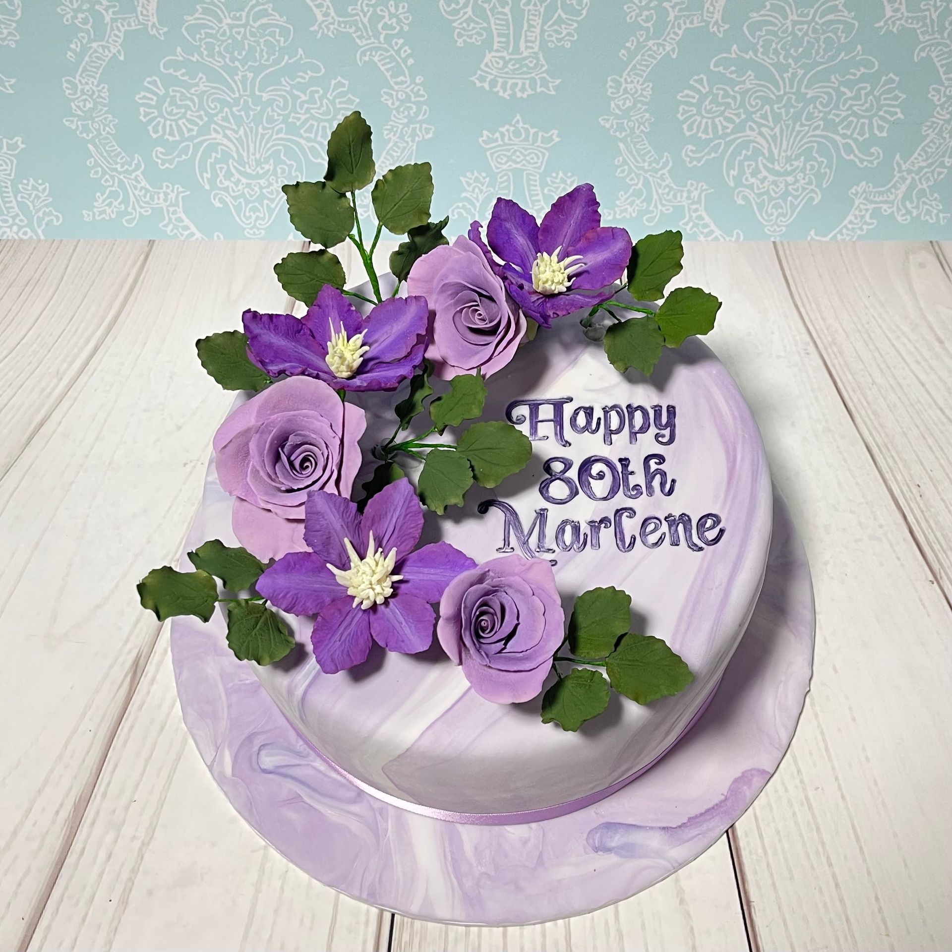 Marbled Mauve Fondant Birthday Cake Port Macquarie With Sugar Clematis Flowers Sugar Roses And Sugar Leaves