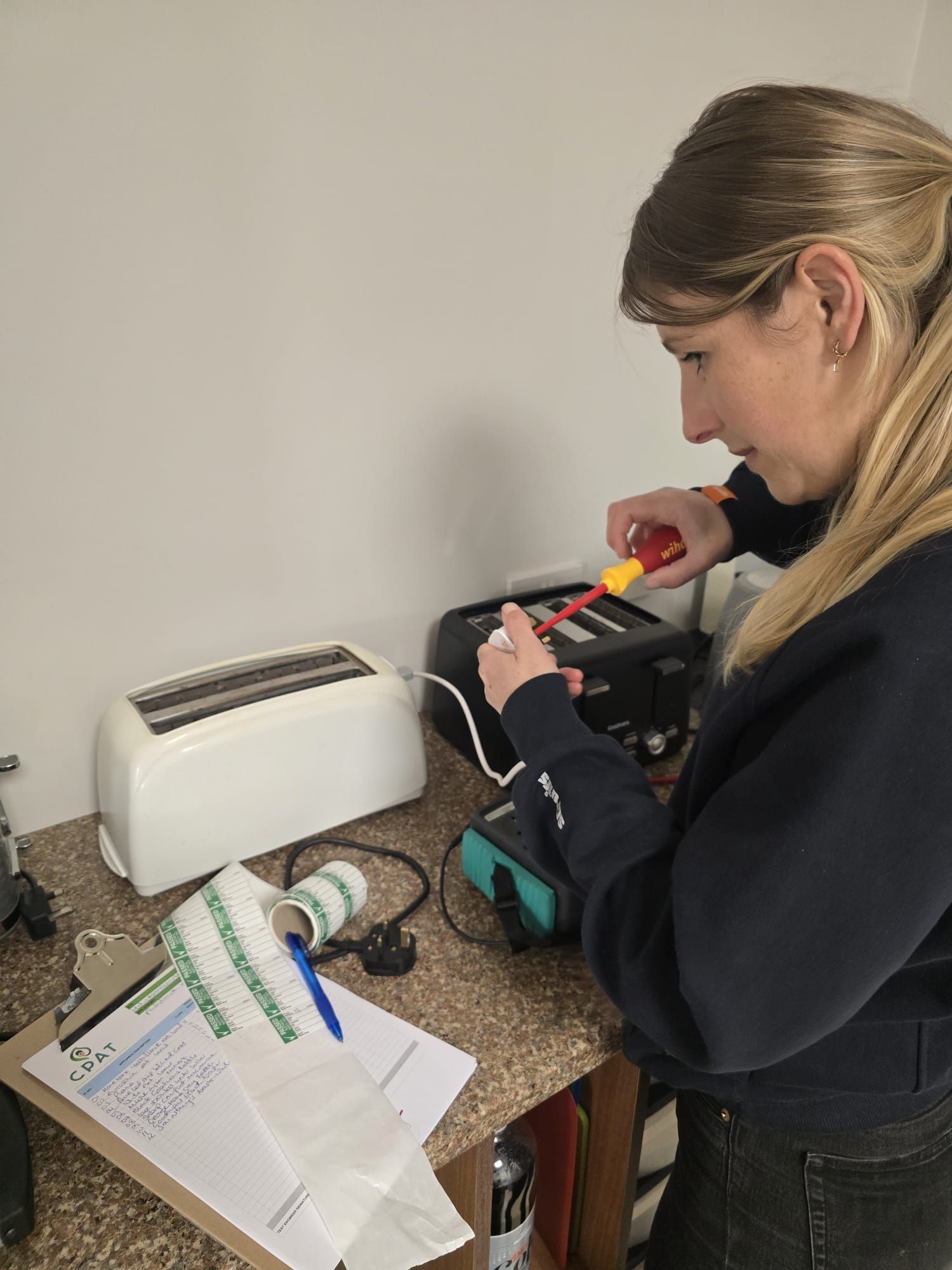 Portable appliance testing at shipping container conversion company