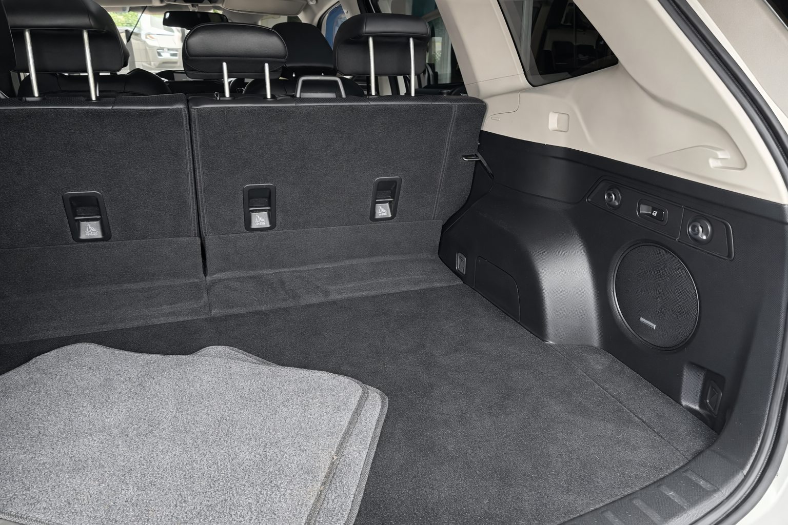A Blue Car With The Hood Up Is Parked In A Garage — All Clean Auto Detailing In Caves Beach, NSW