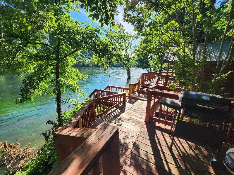 cabins with decks on white river at copper johns resort