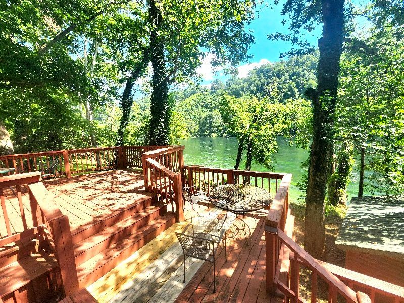 view of white river from wooden walkway at copper johns resort