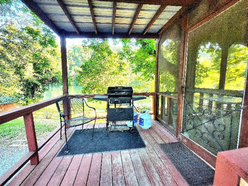 screened sunroom and deck with grill copper johns