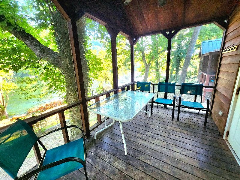 zug bug cabin with deck overlooking river copper johns