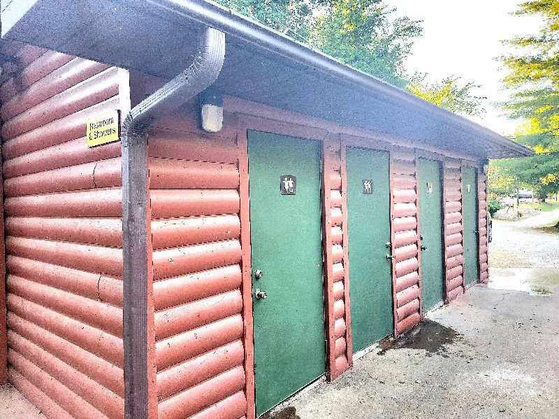 log bathhouse at copper johns resort for camper cabin and RV guests