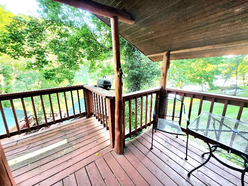 cabin 2 large covered porch overlooking white river at copper johns