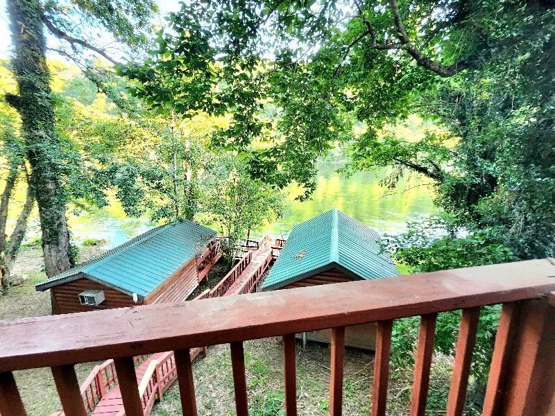 view of riverfront cabins at copper johns resort