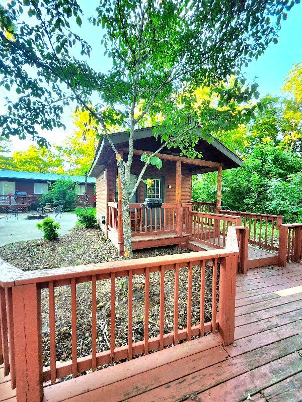 cabin 3 covered porch with charcoal grill copper johns resort