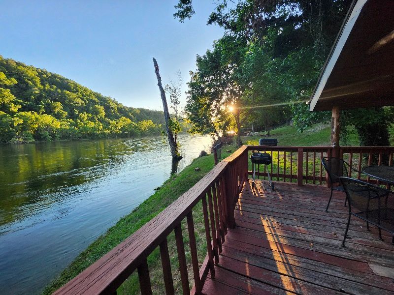 white river view at sunset from cabin 4 at copper johns resort