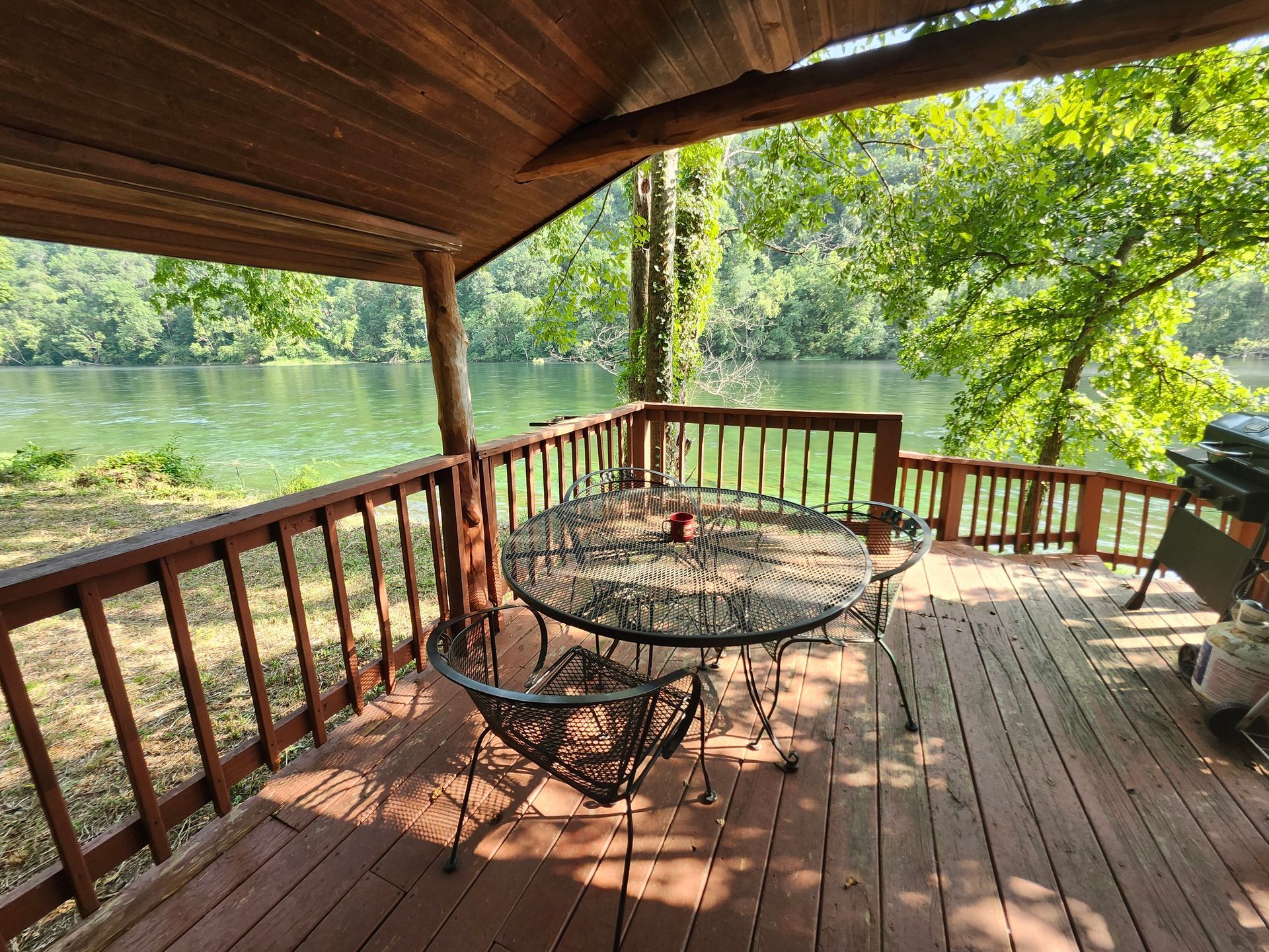 covered porch on the bank of white river cabin 4 copper johns resort