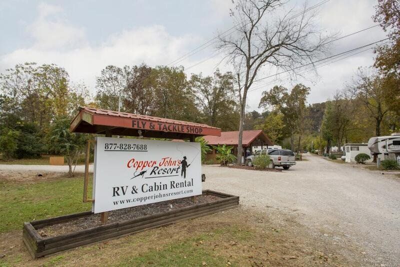 A sign that says rv & cabin rental on it