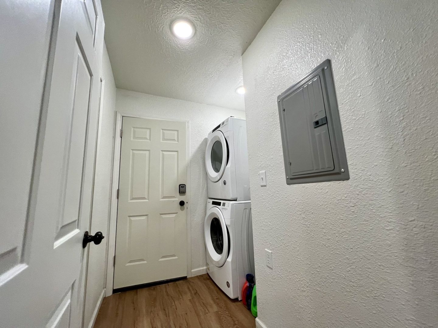 A laundry room with a washer and dryer in a cabin at copper johns resort