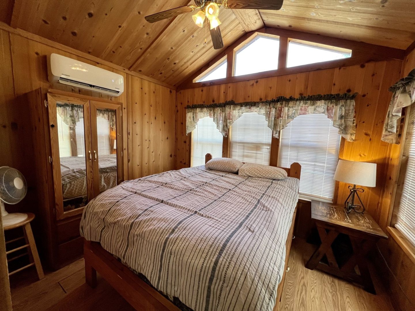 cozy log cabin bedroom at copper johns resort