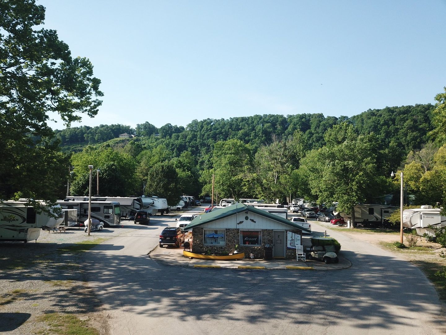 aerial view of shaded pull through and back in oversized RV sites at copper johns resort