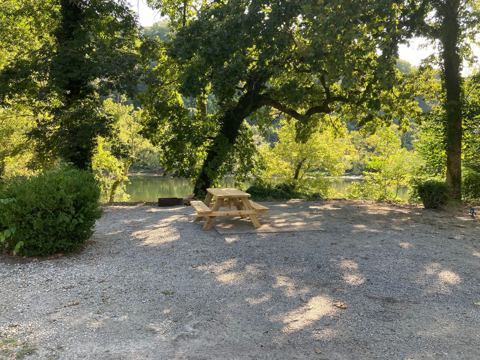 premiere riverfront rv site on white river with firepit and picnic table at copper johns resort