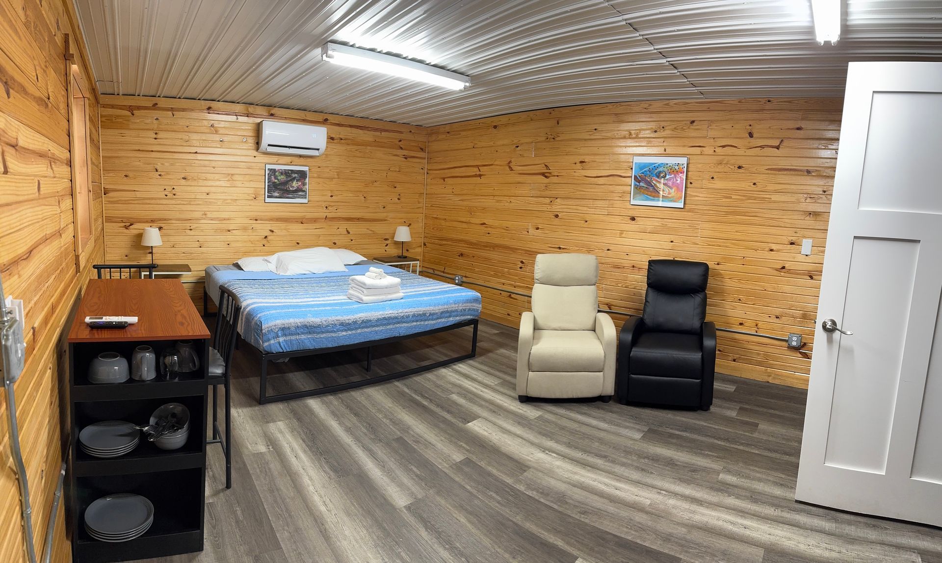 rainbow house suite 2 cabin with rollaway bed, recliner, and desk copper johns