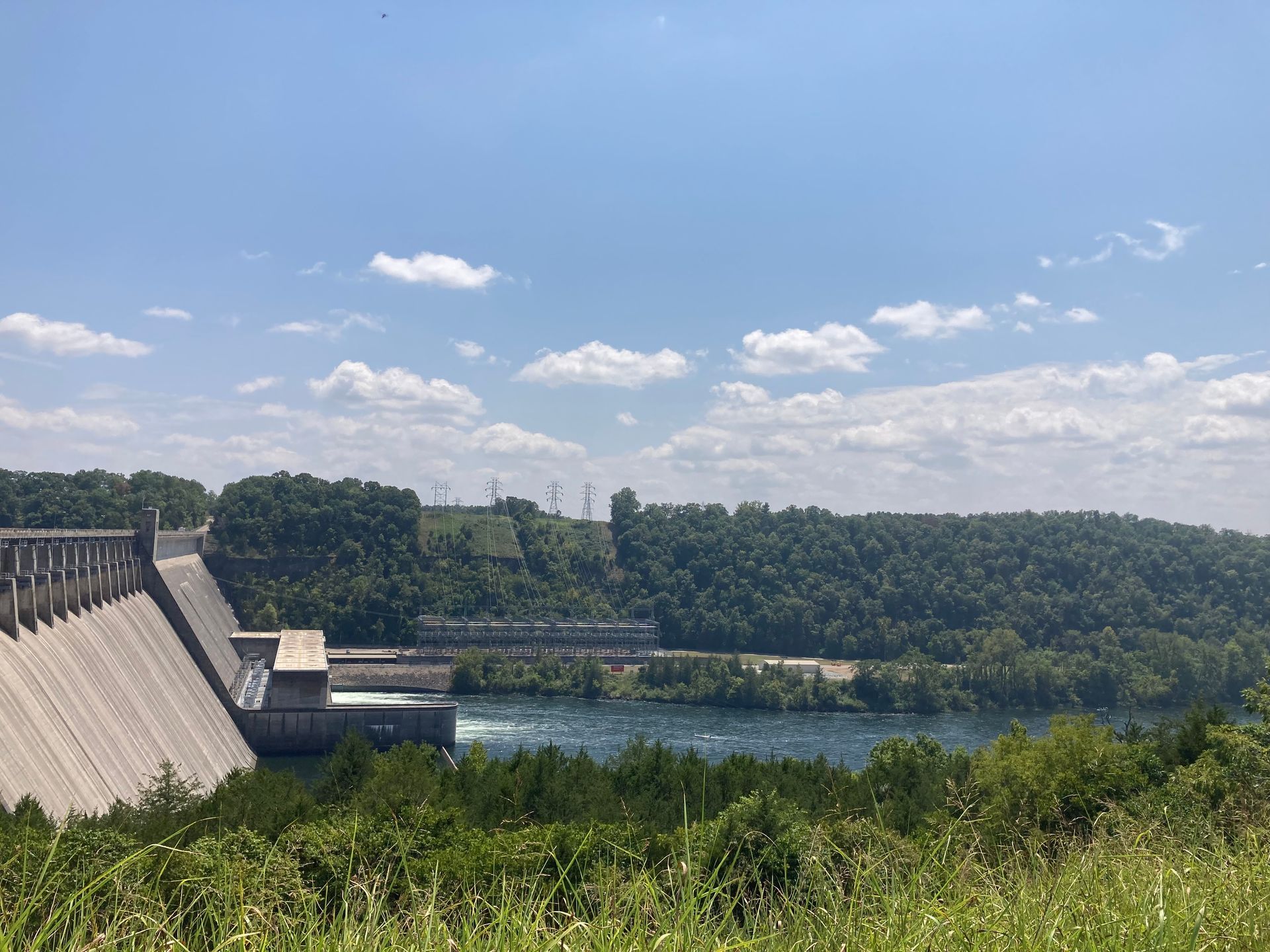 A large dam with water pouring out of it