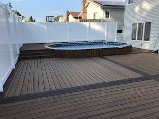 Pool With Wooden Decks Design — Staten Island, NY — Decks R Us