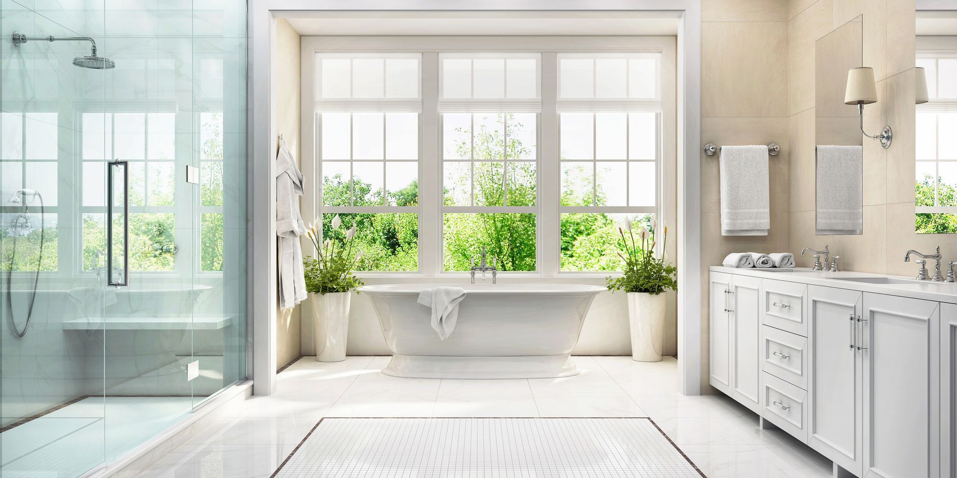 Elegant white bathroom with a large window, a bathtub, a shower, and a vanity