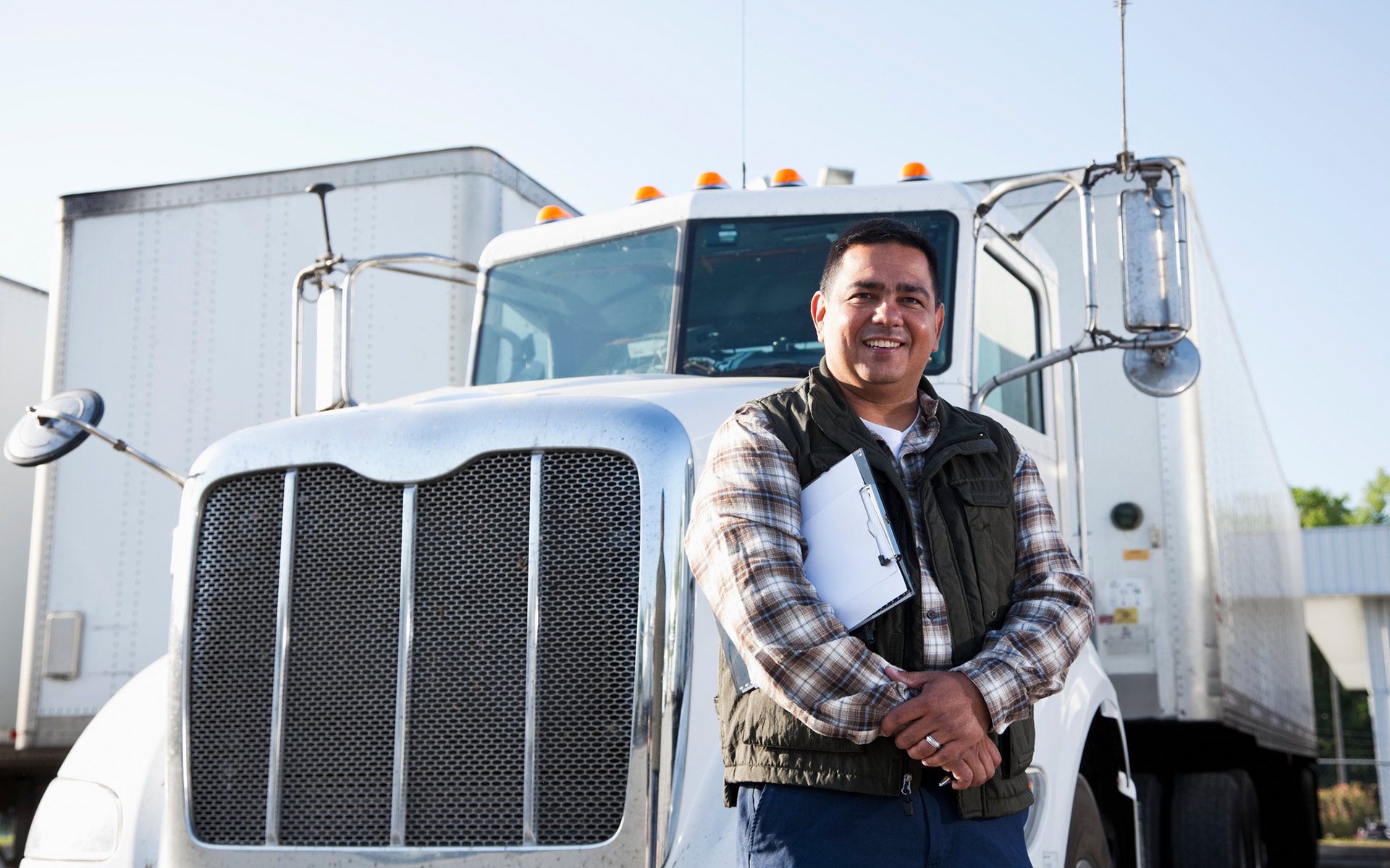 Smiling Truck Driver — Nationwide — Sinclair-Caby Trucking LLC