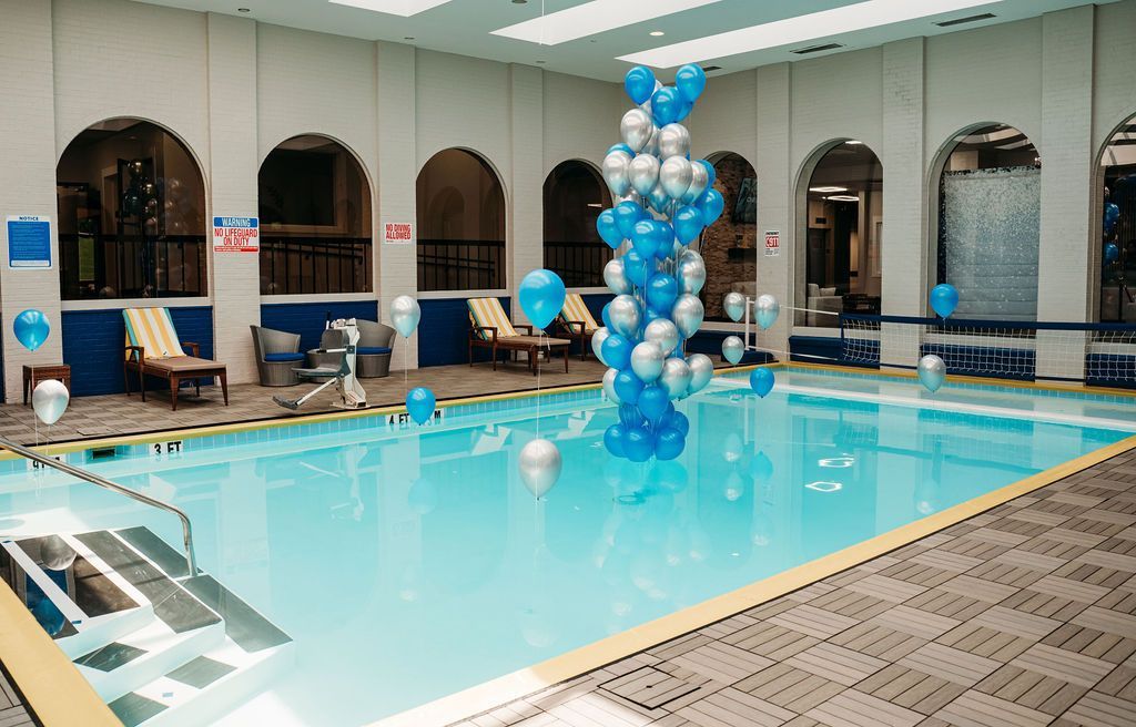 Balloons in the swimming pool during the Silverfern grand opening