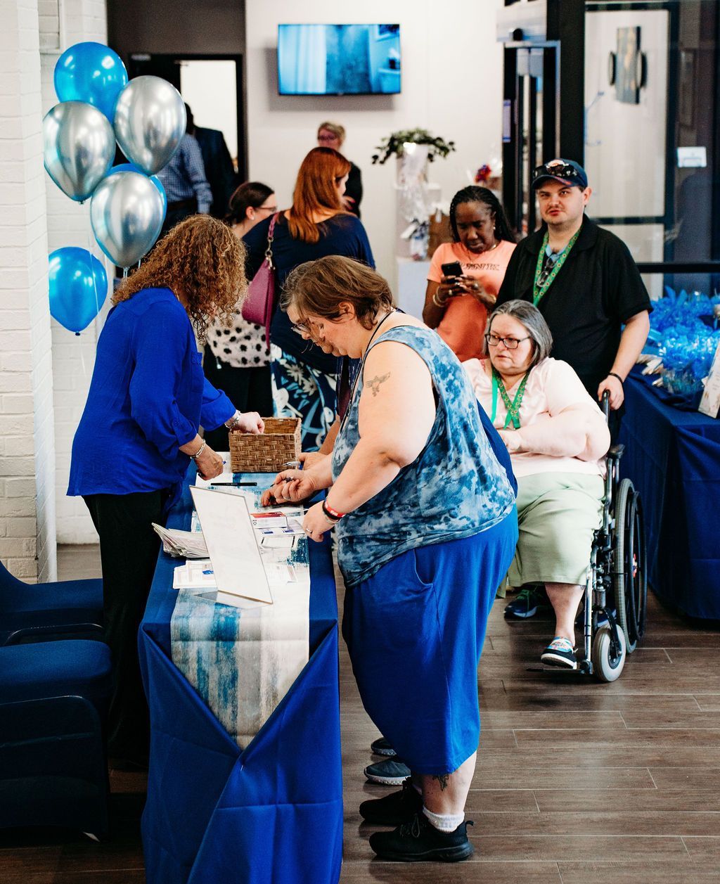 Potential community members signing in to tour Silverfern