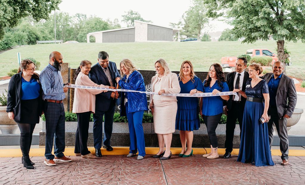 Our staff during the ribbon-cutting ceremony at our grand opening