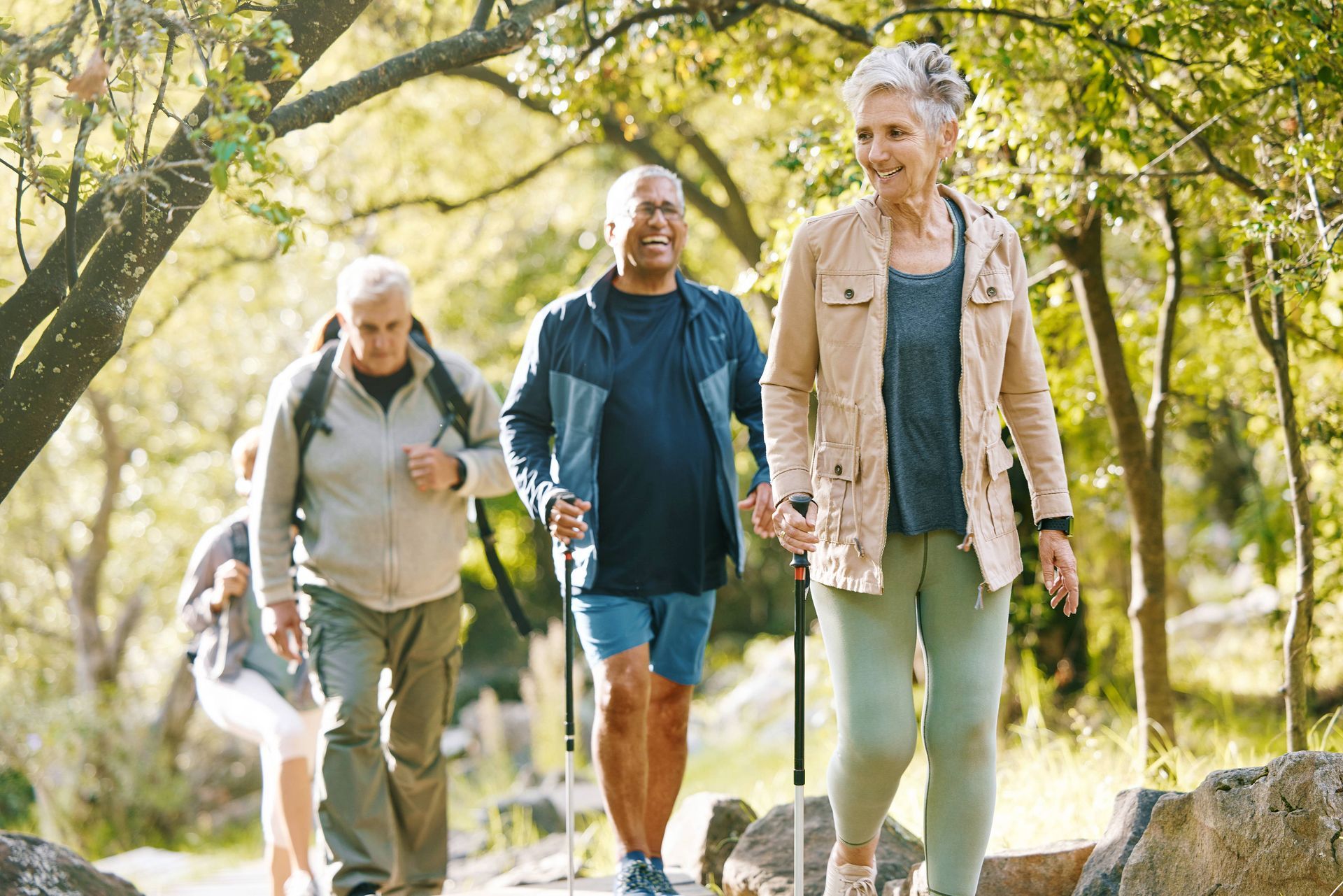 Four adults over 55 enjoying a hike together near Cincinnati, Ohio